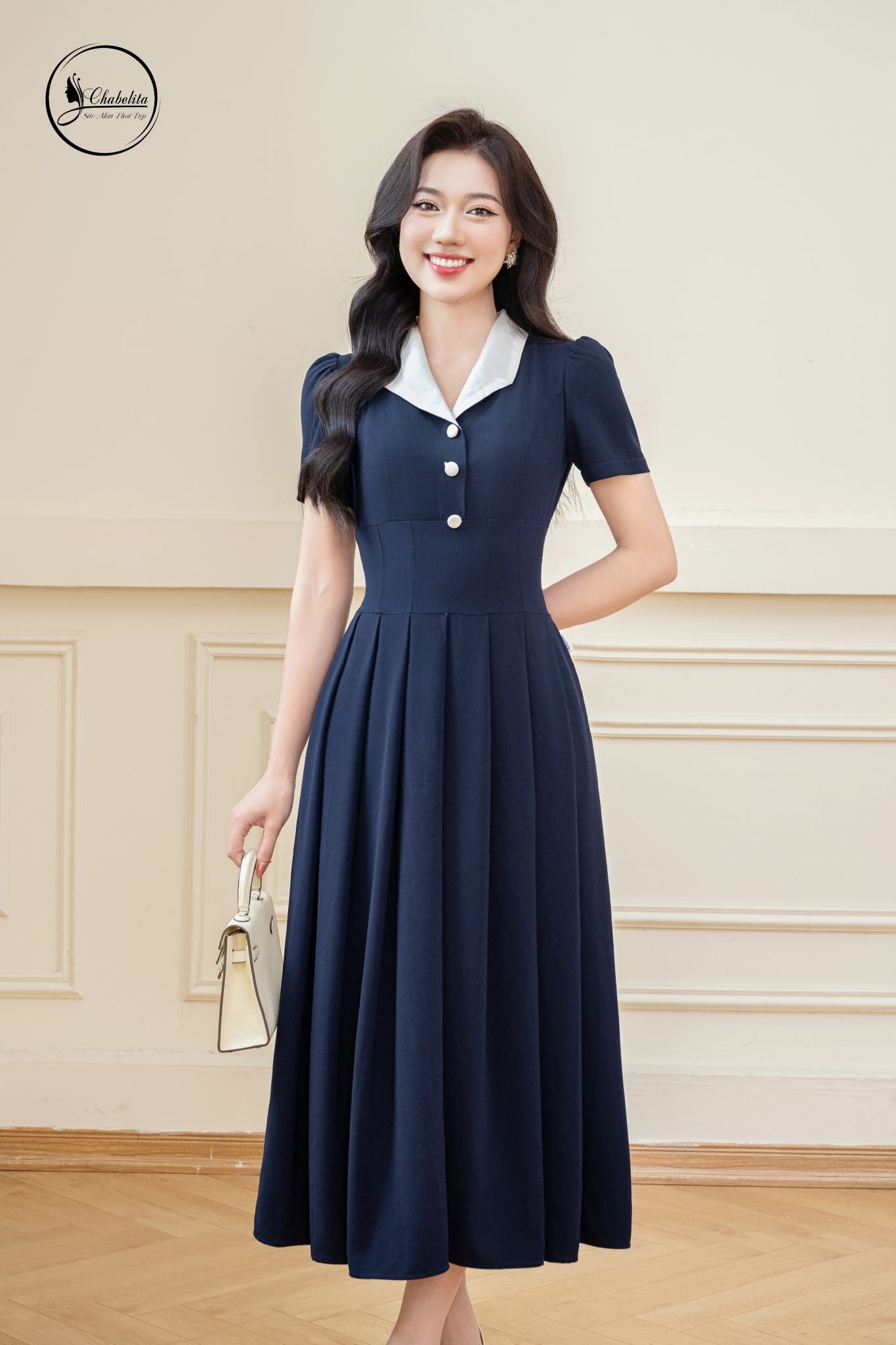 Đầm xòe tay lỡ phối cổ màu xanh than