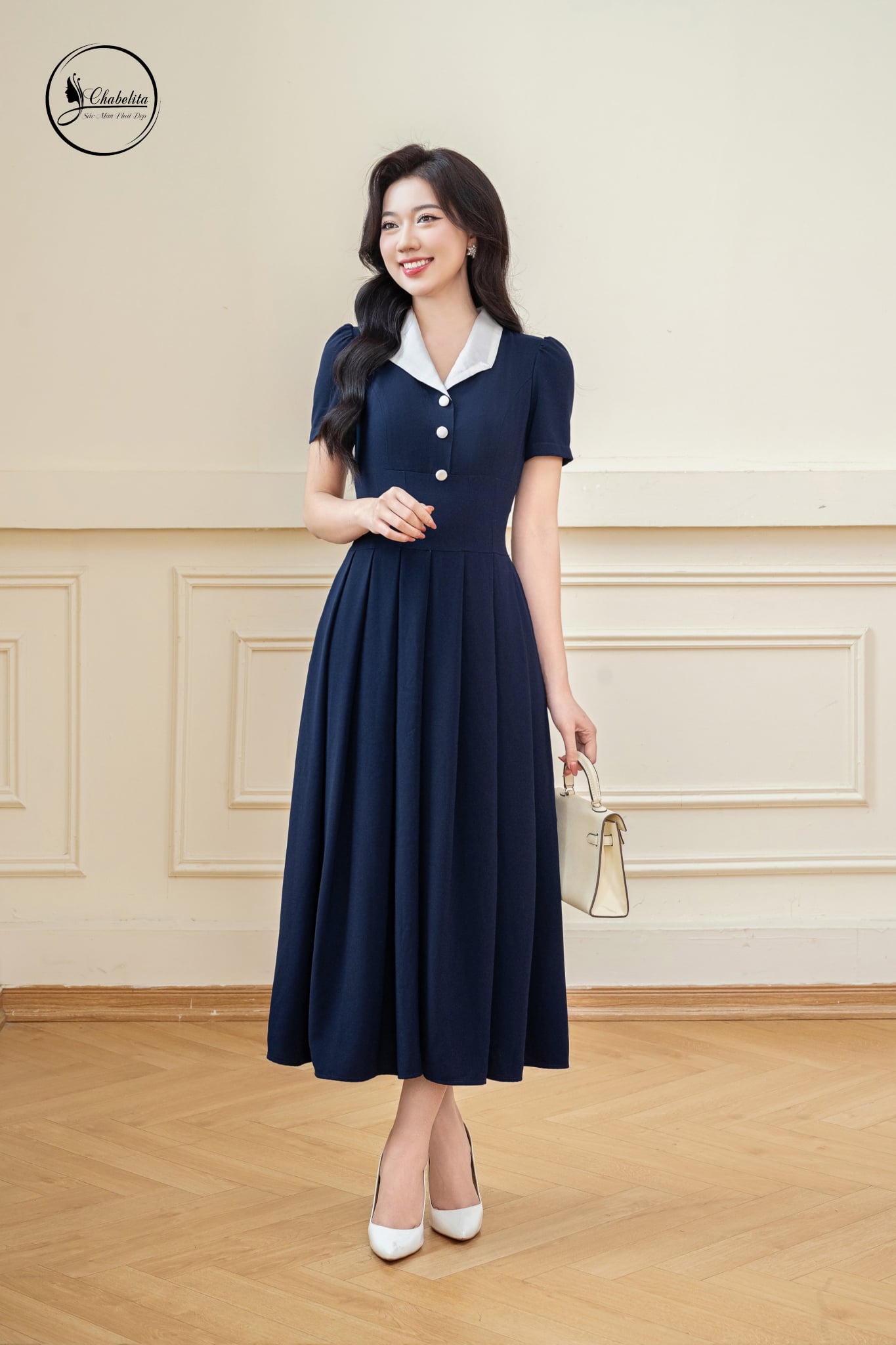 Đầm xòe tay lỡ phối cổ màu xanh than