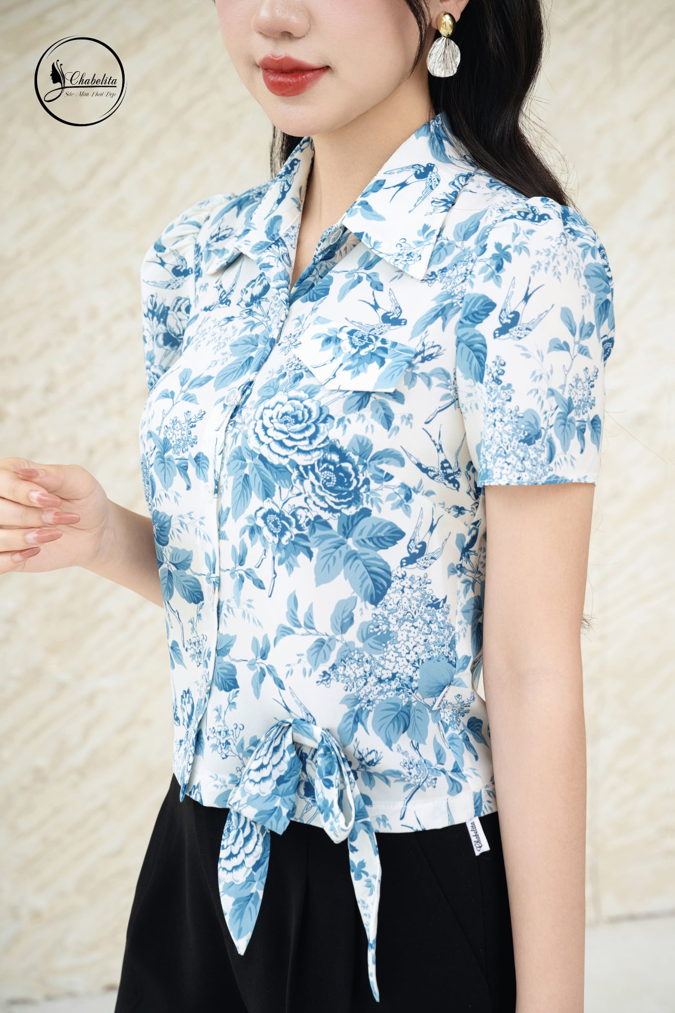 Sơ mi tay lỡ đính nơ hoa xanh