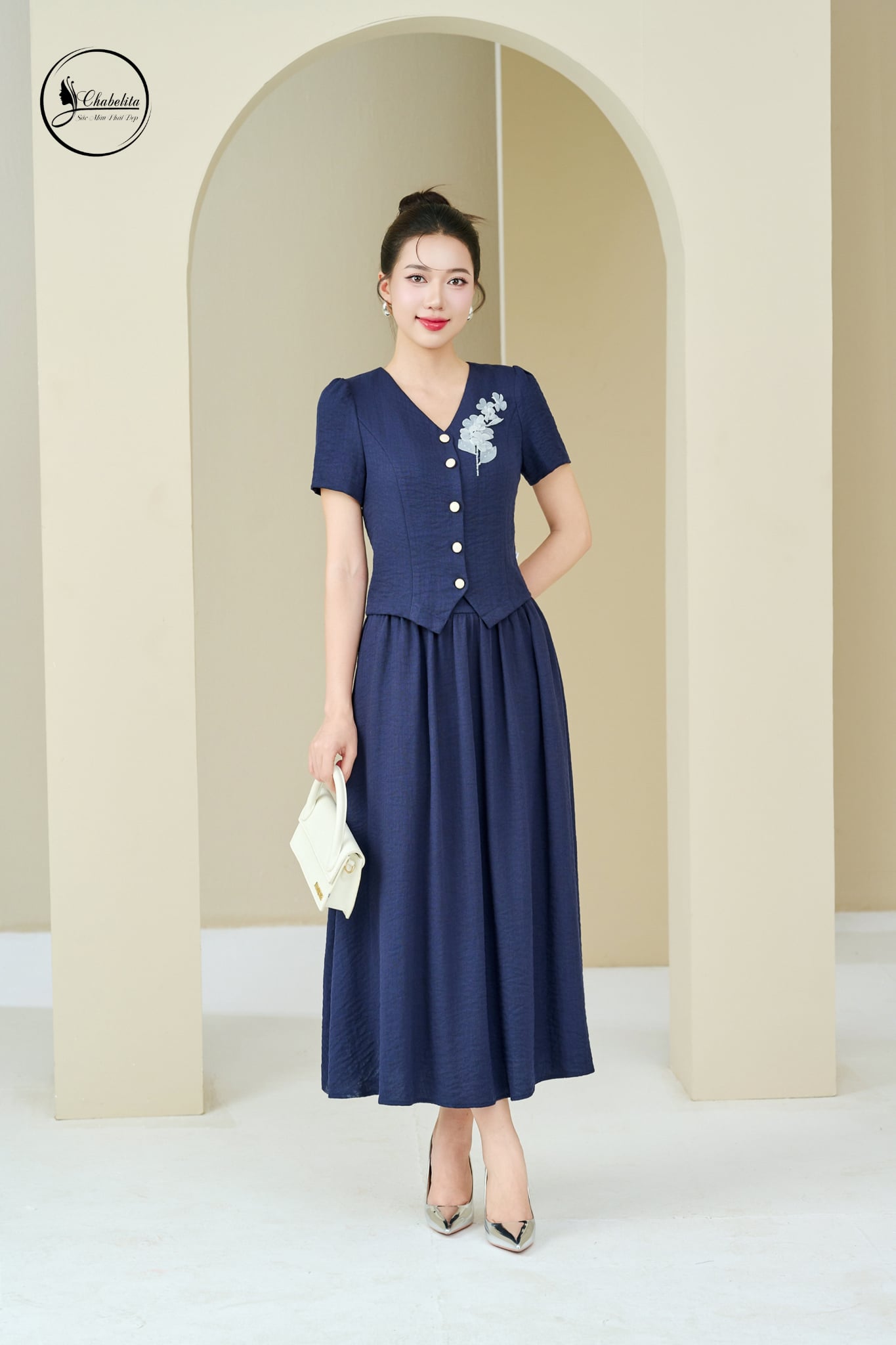 Sét bộ áo tay cộc cổ tim phối chân váy màu xanh than