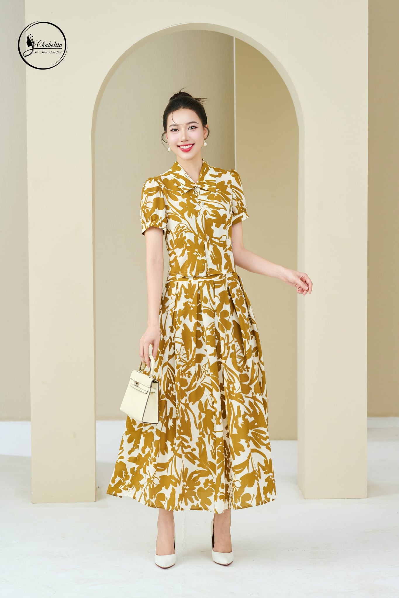 Sét bộ áo sơ mi phối chân váy màu vàng