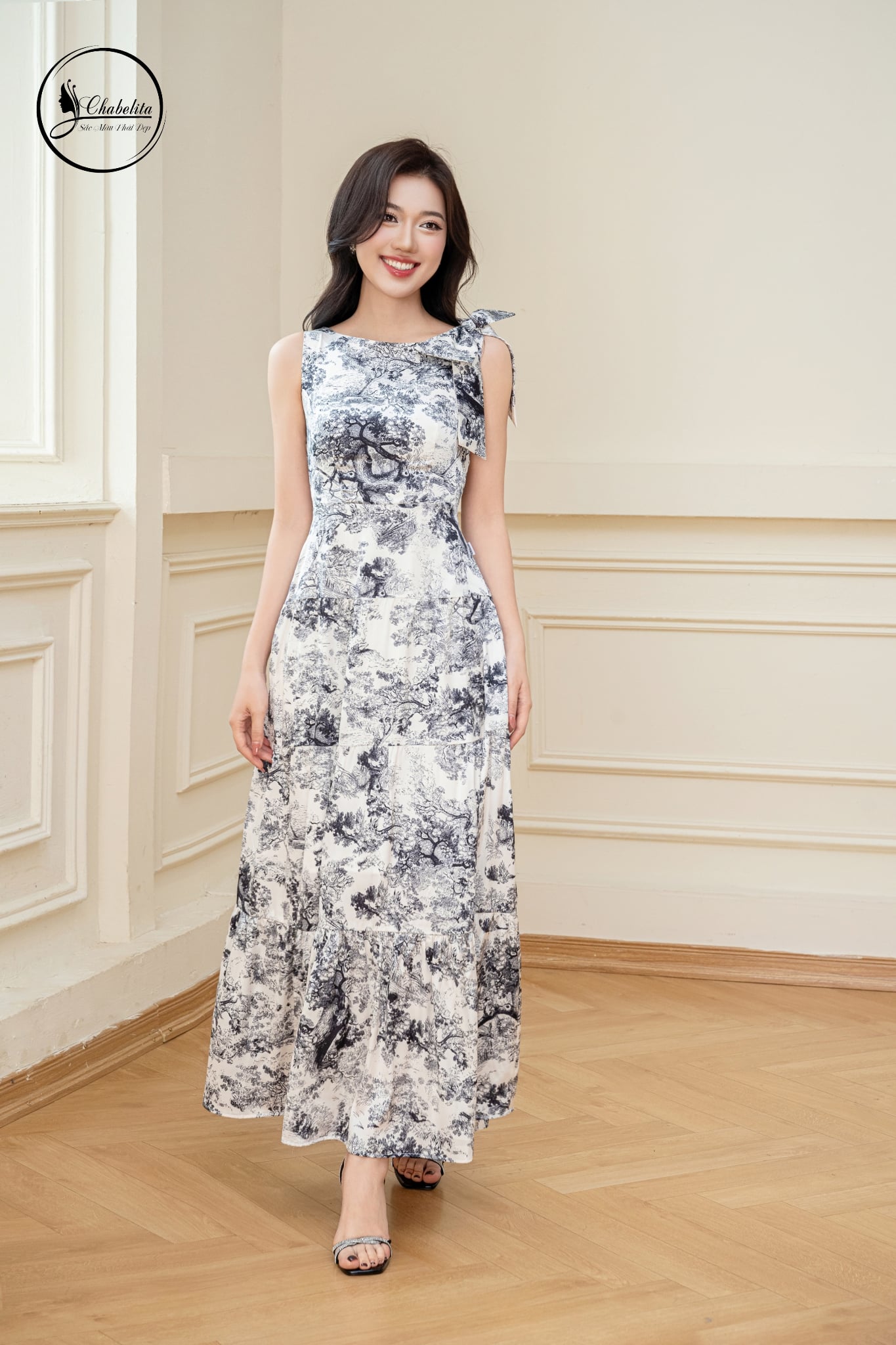 Đầm sát nách họa tiết đính nơ