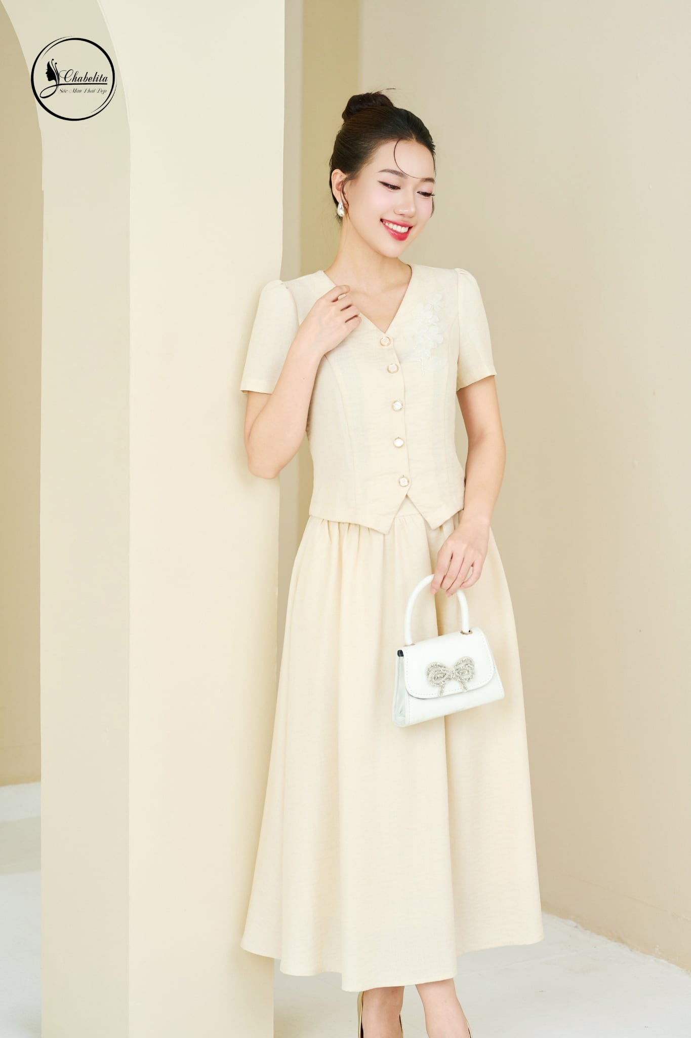 Sét bộ áo tay cộc cổ tim phối chân váy màu be