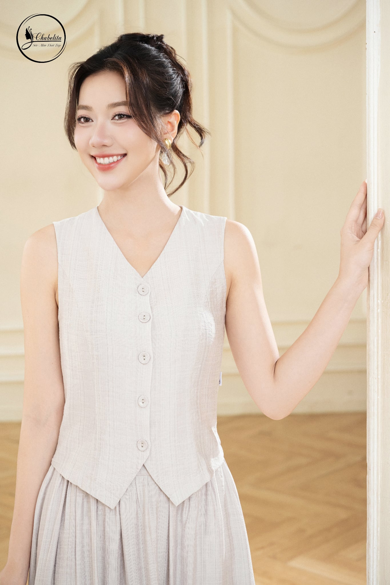 Sét bộ áo sát nách cổ tim phối chân váy màu xám