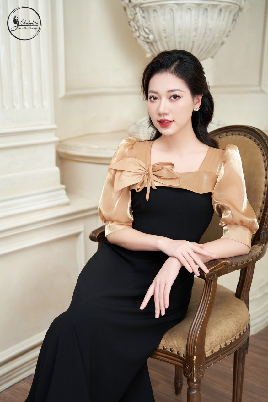 Đầm phối tay ngực màu đen