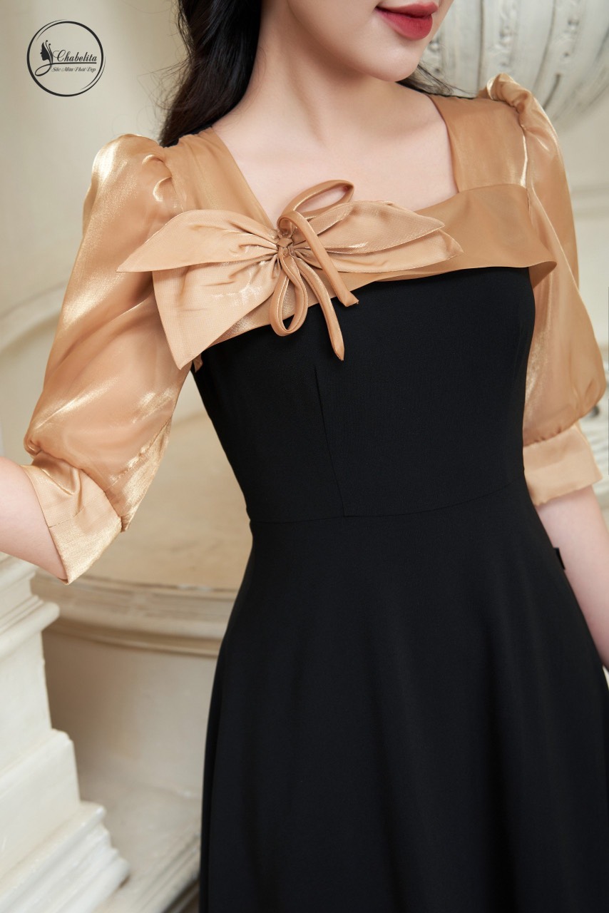 Đầm phối tay ngực màu đen