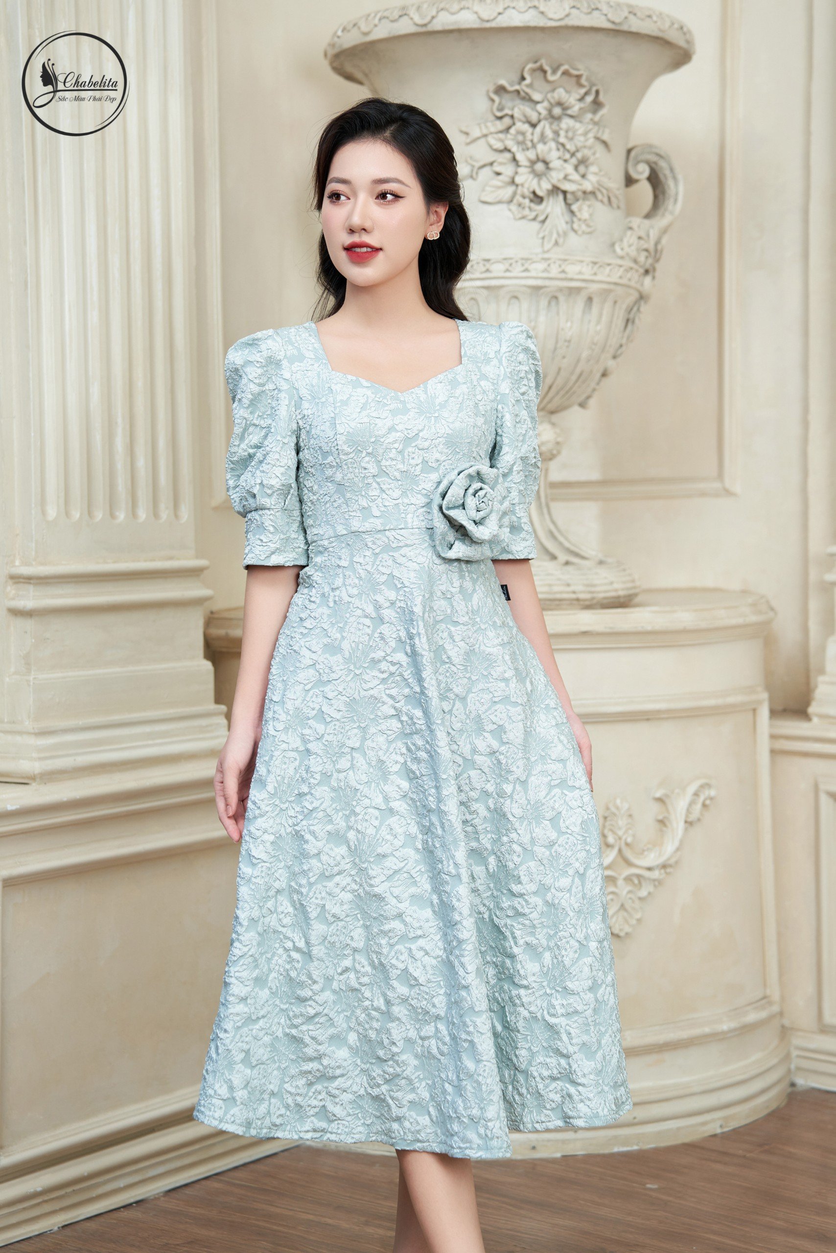 Đầm gấm màu xanh