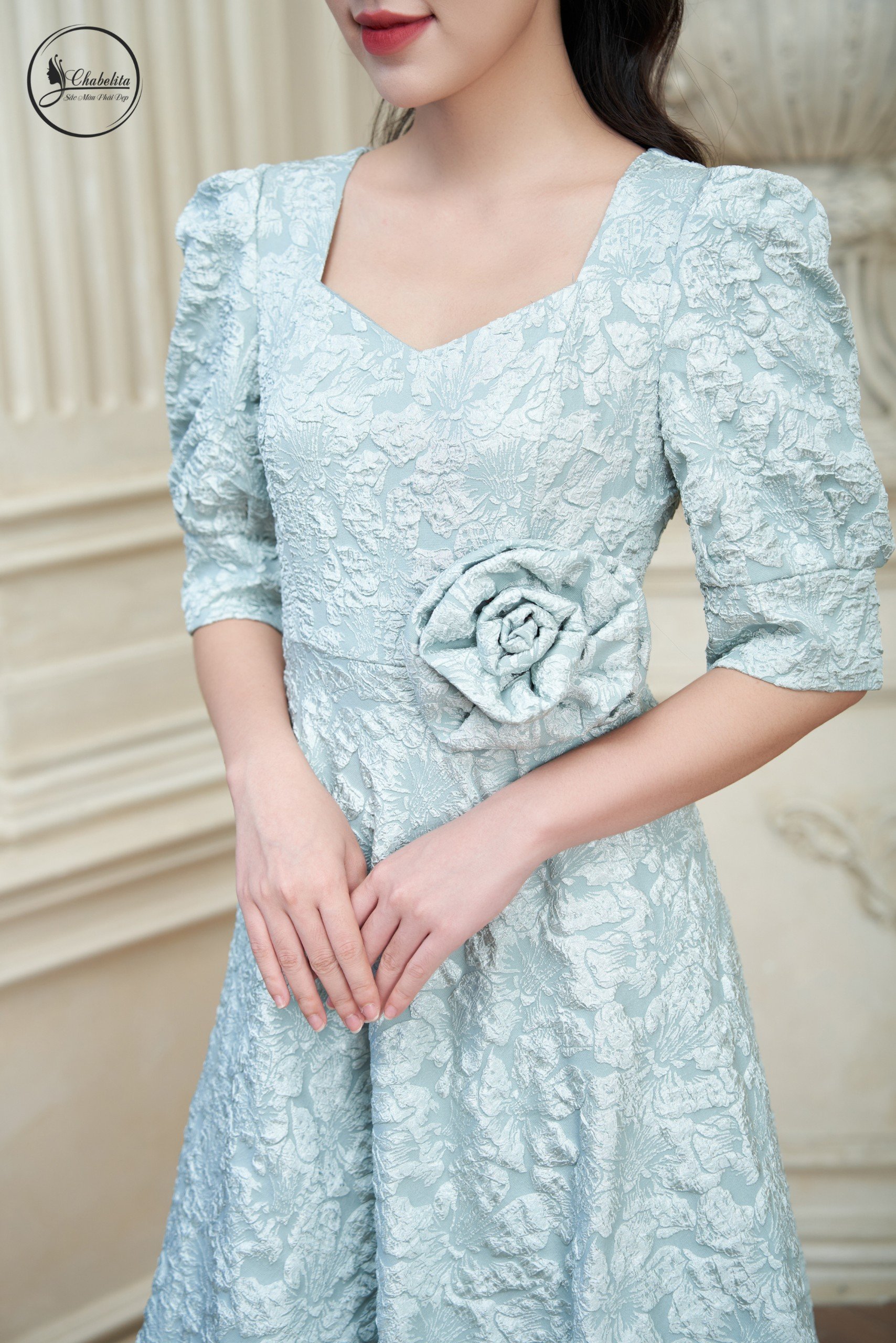 Đầm gấm màu xanh