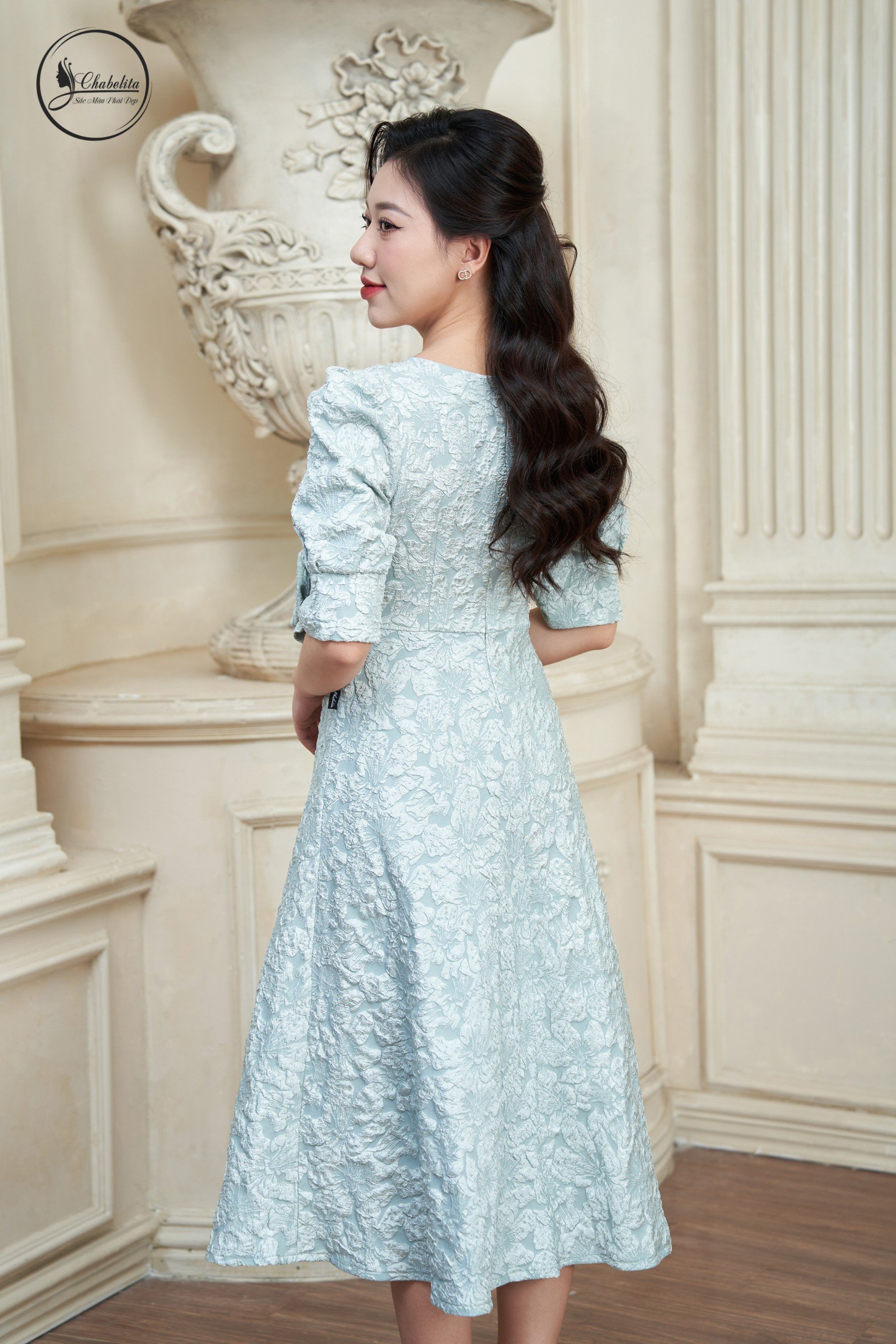 Đầm gấm màu xanh