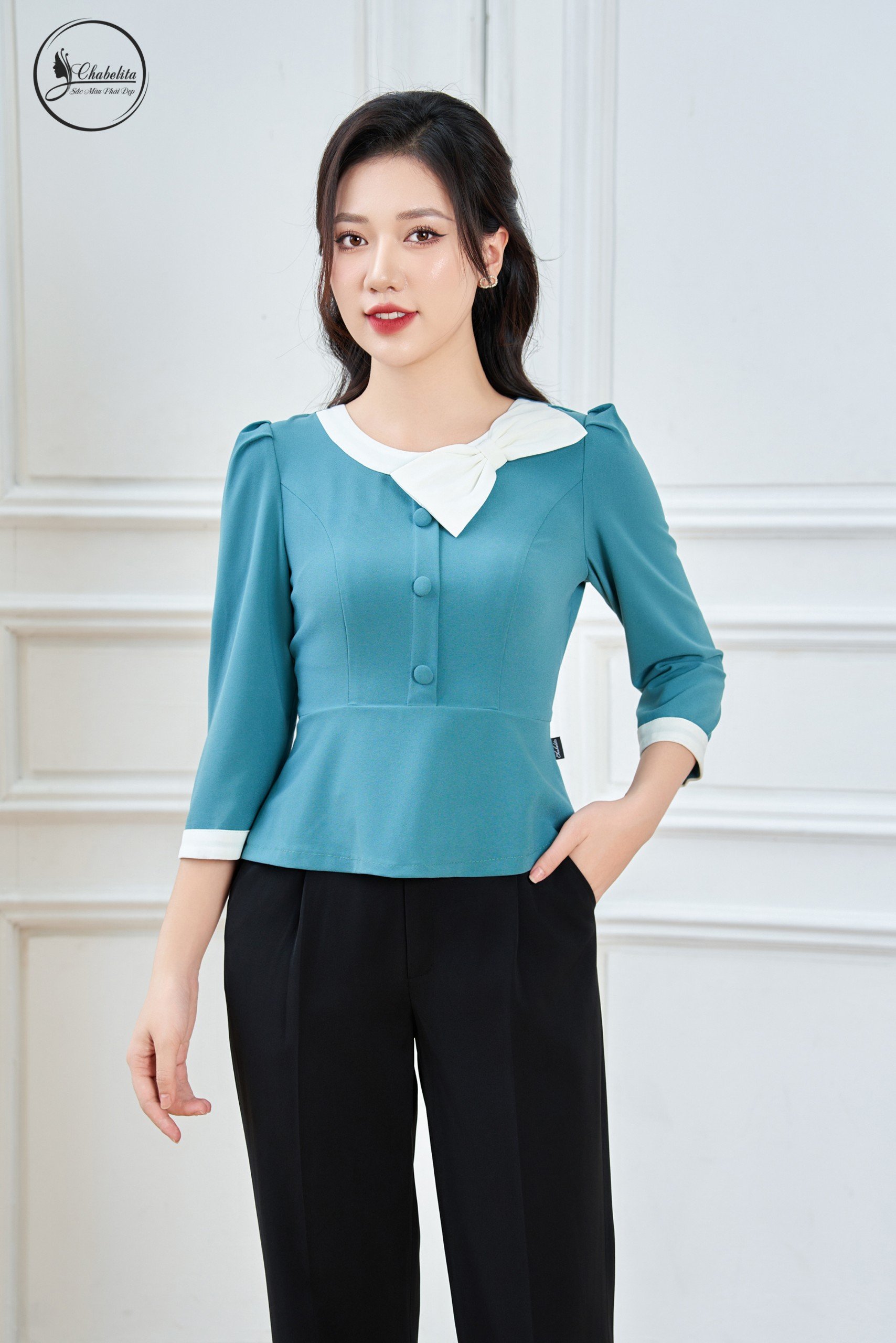 Sơ mi cổ tròn phối nơ màu xanh
