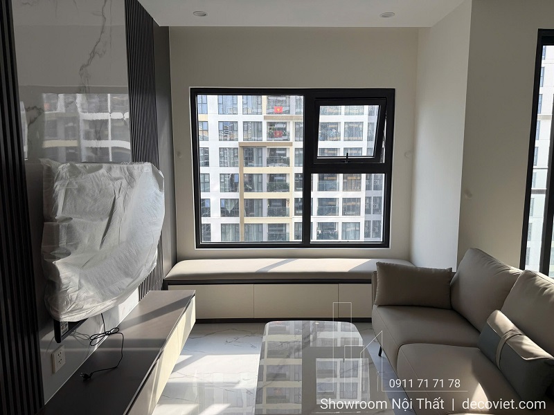 Thiết kế nội thất phòng khách chung cư nhỏ tối ưu không gian với sofa gọn và kệ tivi treo tường