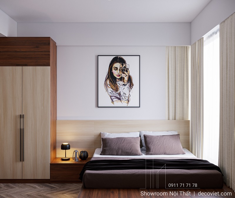 Phòng ngủ master với giường bọc nệm và tủ gỗ tone sáng