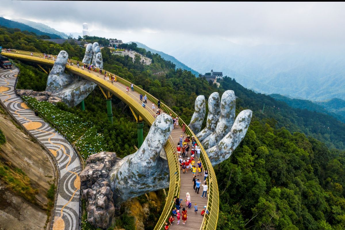 Golden Bridge held by giant stone hands at Ba Na Hills, Da Nang
