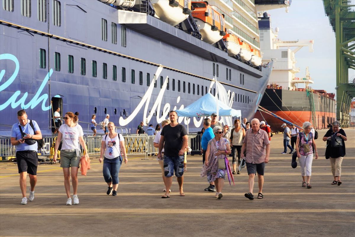 Cruise passengers walking off the ship at Phu My port