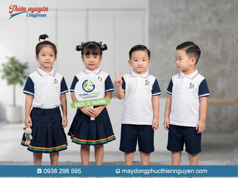 Mẫu đồng phục cho trẻ mầm non trường Global Ecokids tông màu trắng, xanh đậm kết hợp với viền cầu vồng sắc màu rực rõ