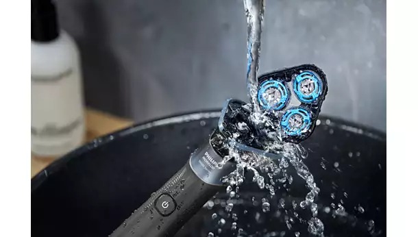 Vệ sinh dễ dàng bằng cách mở đầu máy chỉ với một nút bấm