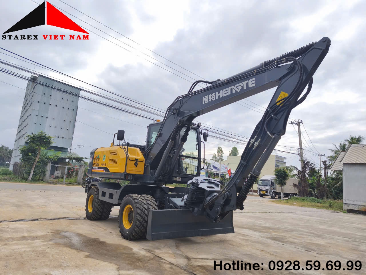 máy đào gắp gỗ