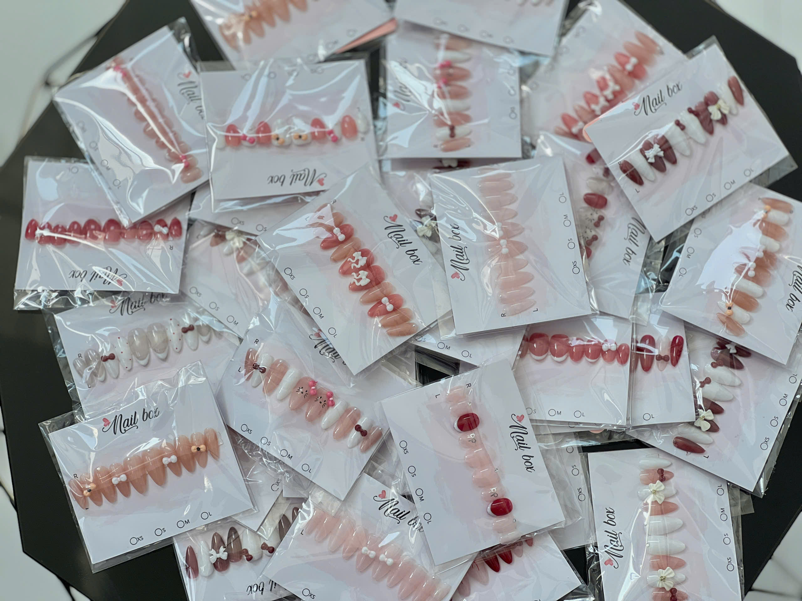 Nail Nơ
