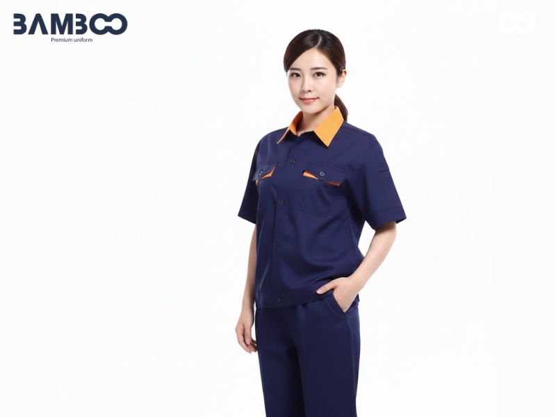 Chi phí may áo bảo hộ lao động màu xanh đen thay đổi linh hoạt dựa trên yêu cầu cụ thể của từng doanh nghiệp