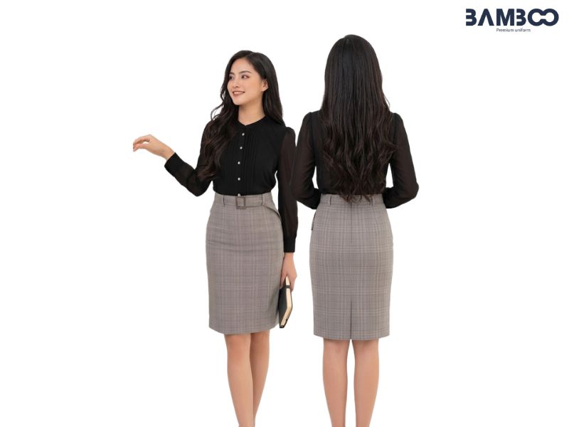 Chi phí may váy xám caro phụ thuộc vải, thiết kế, tay nghề và số đo