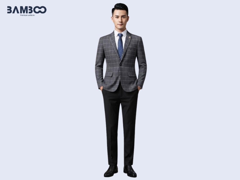 Chi phí may vest nam xám caro to phụ thuộc chất liệu, thiết kế, số lượng và yêu cầu
