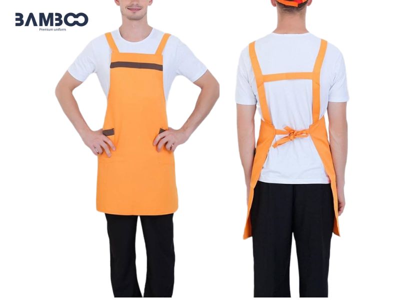 Chi phí may tạp dề nhân viên phục vụ nhà hàng phụ thuộc vào chất liệu vải, số lượng đặt hàng và công nghệ in thêu logo