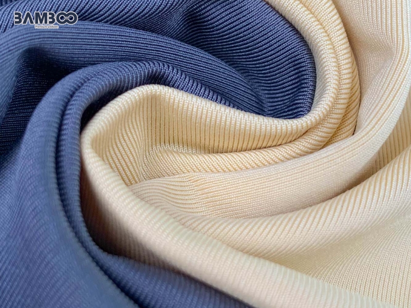 Vải thun lạnh 4 chiều kết hợp sợi tổng hợp và Spandex, tạo độ co giãn, bền và thoáng mát