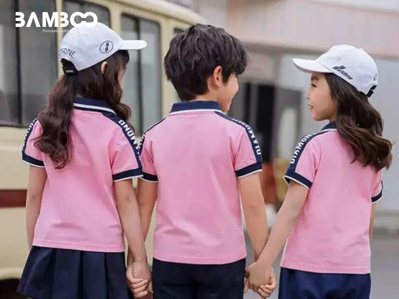 Đồng phục hồng cho trường học trẻ trung, thoải mái, tôn sự thân thiện và chuyên nghiệp