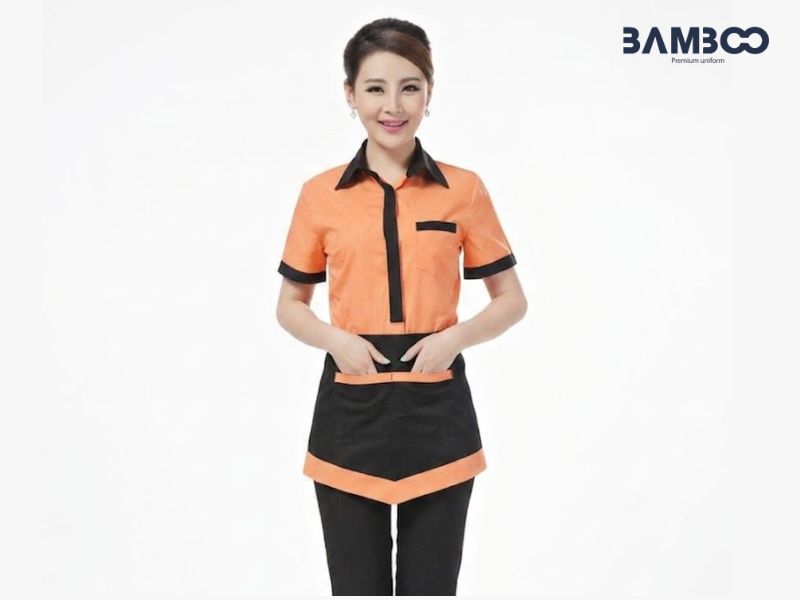 May đồng phục tạp dề nên chọn vải bền, thoáng khí, đường chỉ chắc chắn