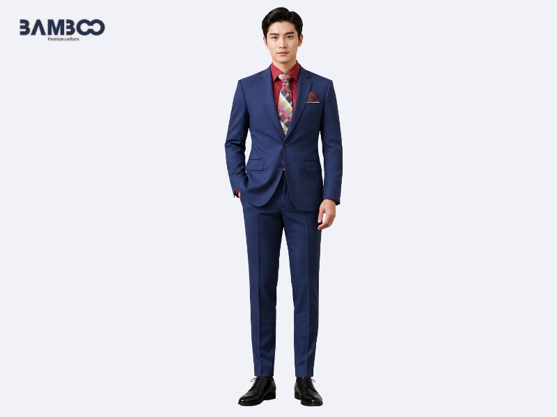 Quy trình may vest xanh dương đậm chuẩn gồm đo, thiết kế, may và kiểm tra