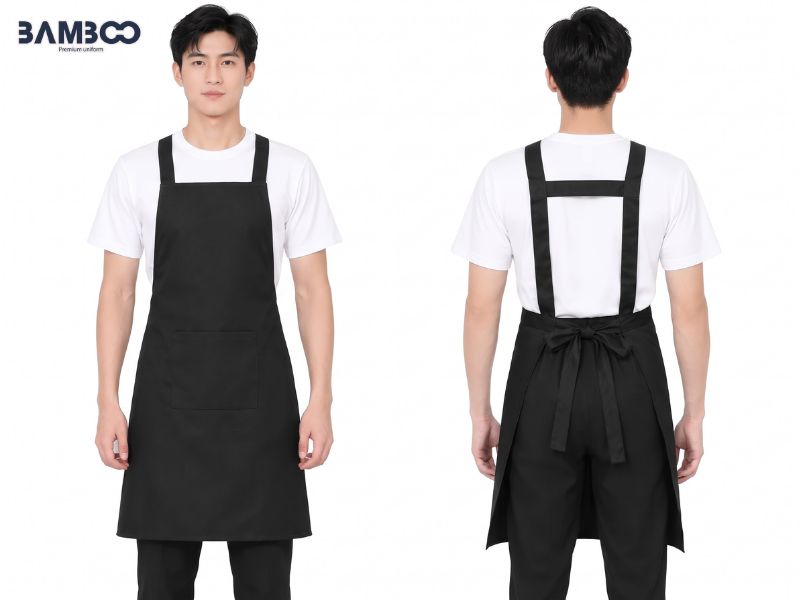 Tạp dề quán nướng có kiểu yếm hoặc ngang hông, vải bền chắc, tích hợp túi tiện dụng