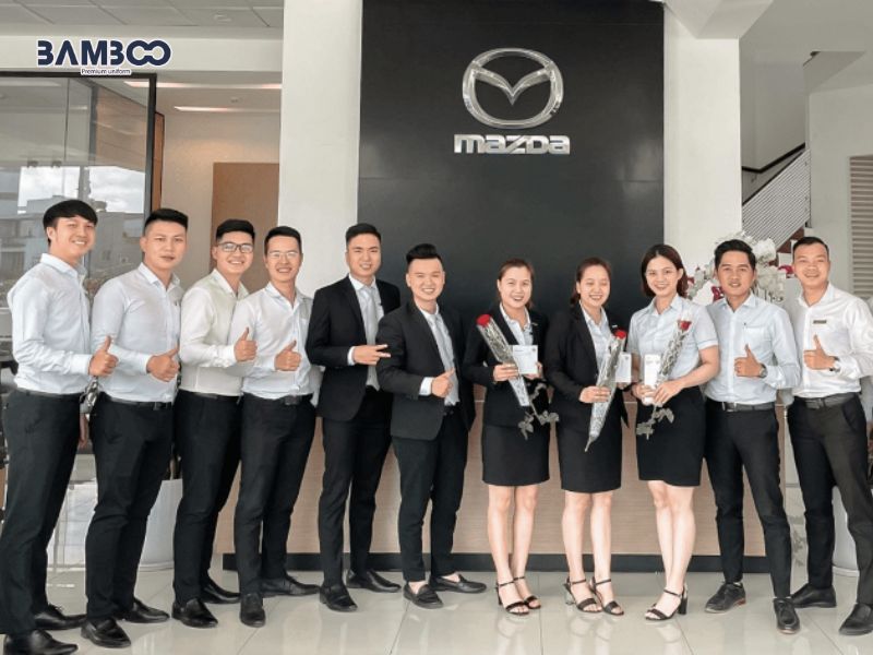 Vest đồng phục Mazda màu đen sang trọng, đứng phom, phối sơ mi trắng chuyên nghiệp