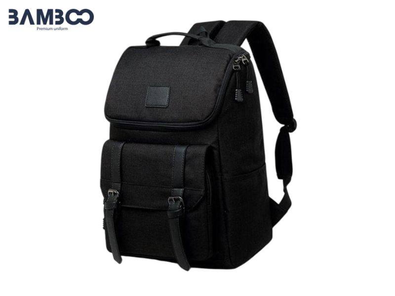 Mẫu balo đồng phục nắp gập đen tối giản, bền đẹp, chống thấm, nhiều ngăn