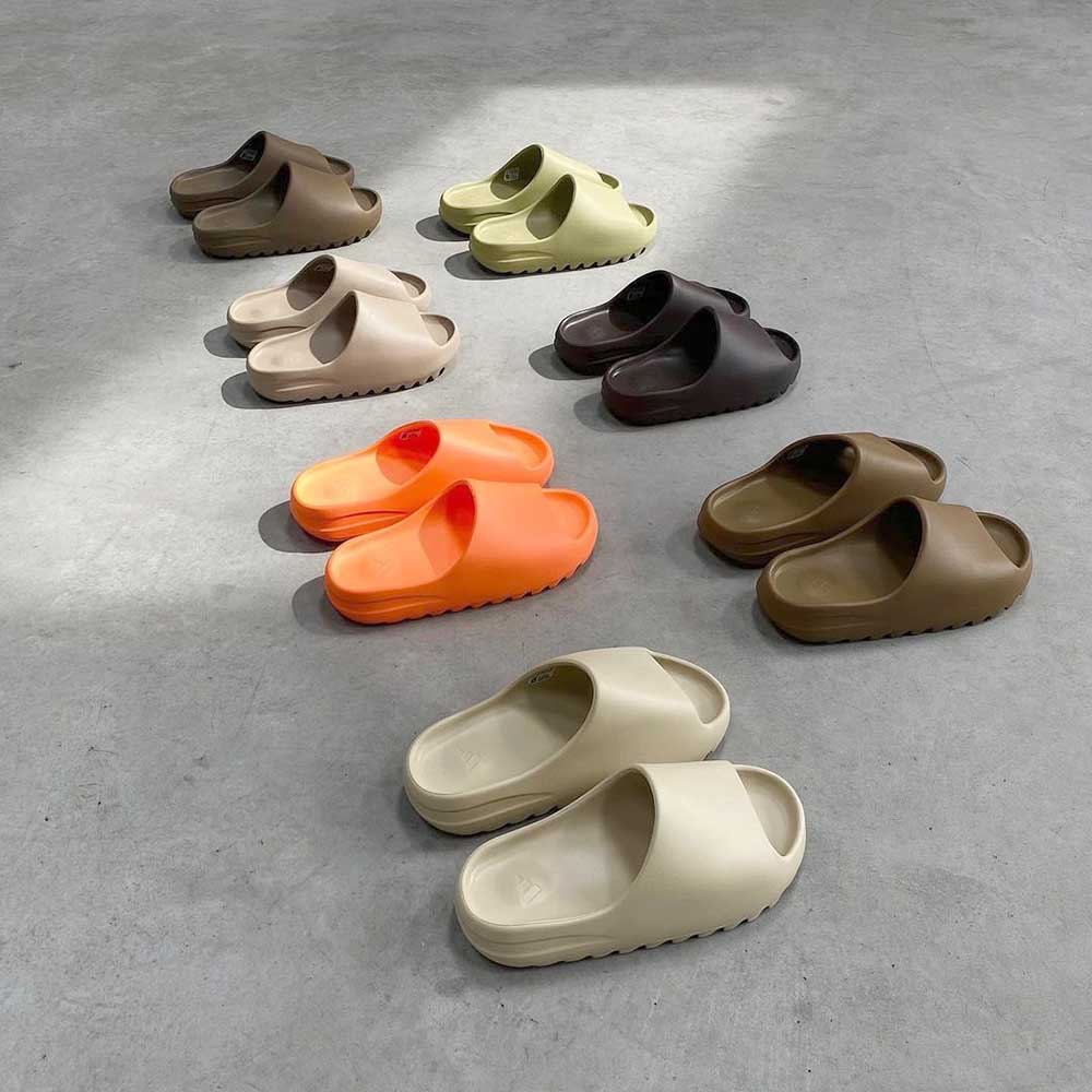 orange yeezy slides