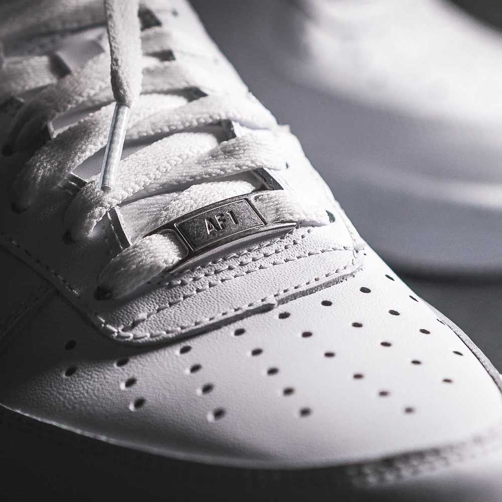 triple white nike shoes