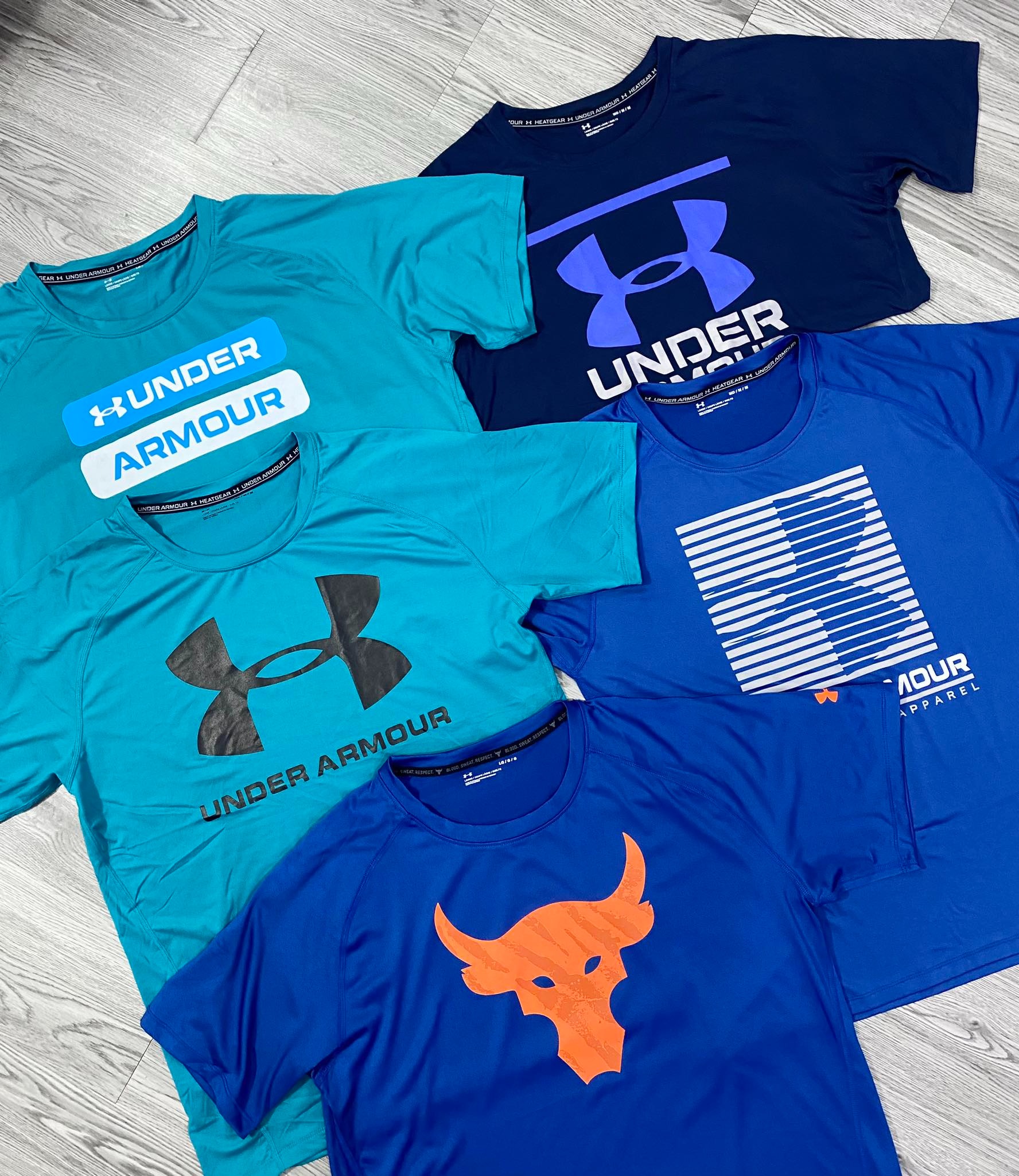 ao-phong-under-armour-project-rock-brahma-bull-blue-1361733-471-hang-chinh-hang