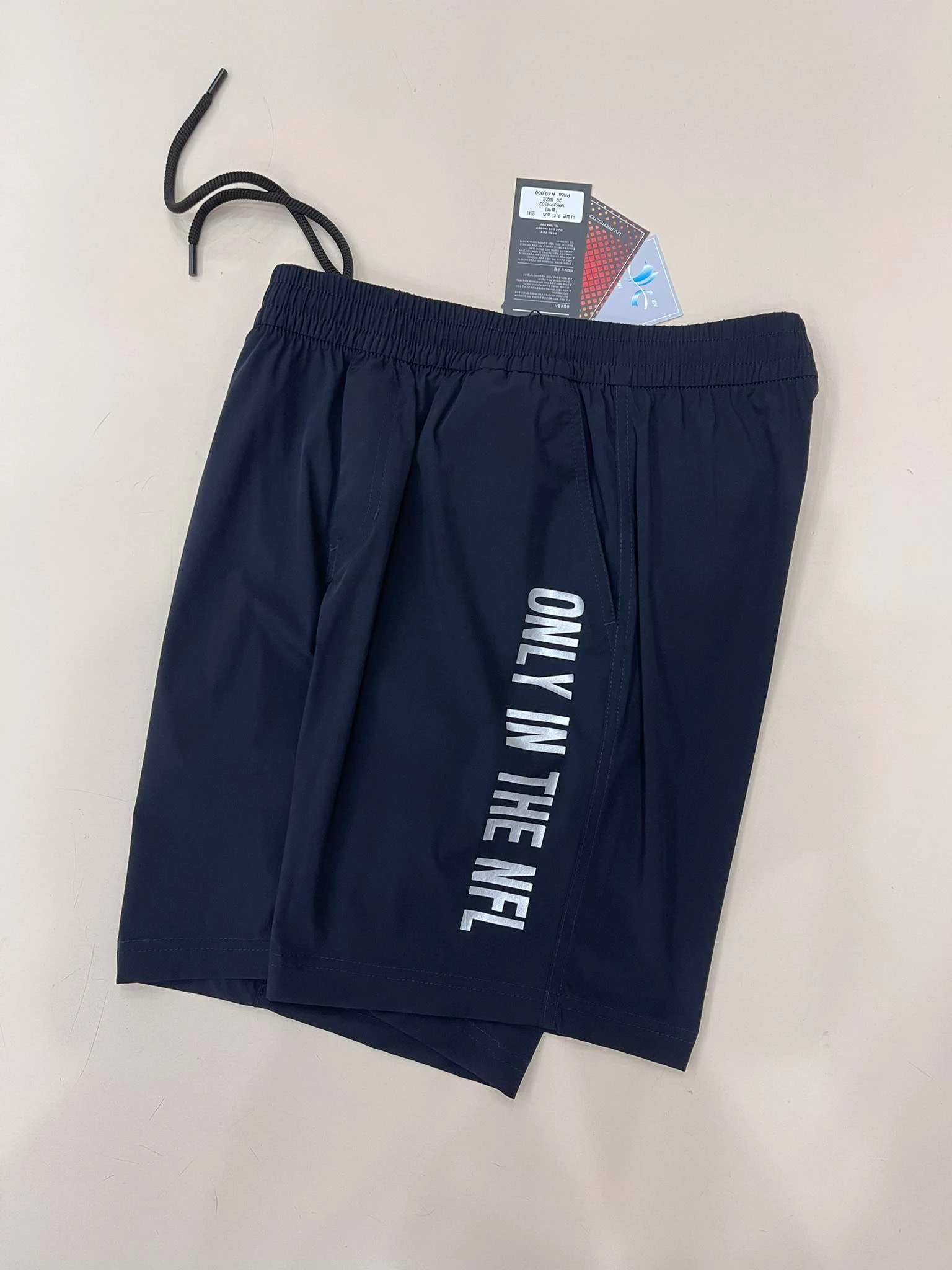 qua-n-thoi-trang-nfl-7-5-team-short-black-navy-nf013-hang-chinh-hang