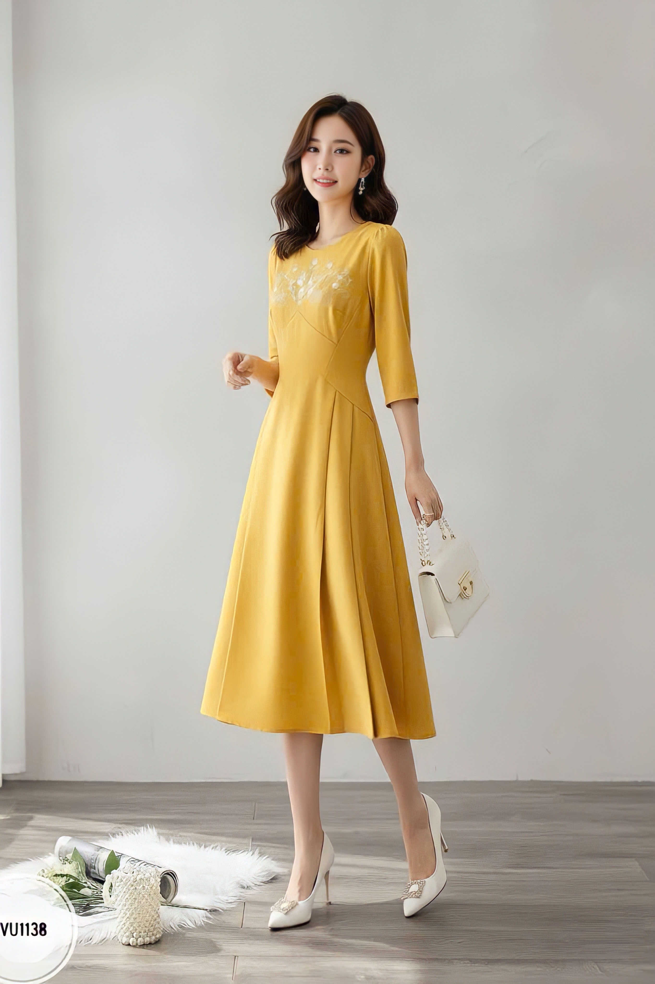 Váy cổ tròn can cúp ngực tay bồng