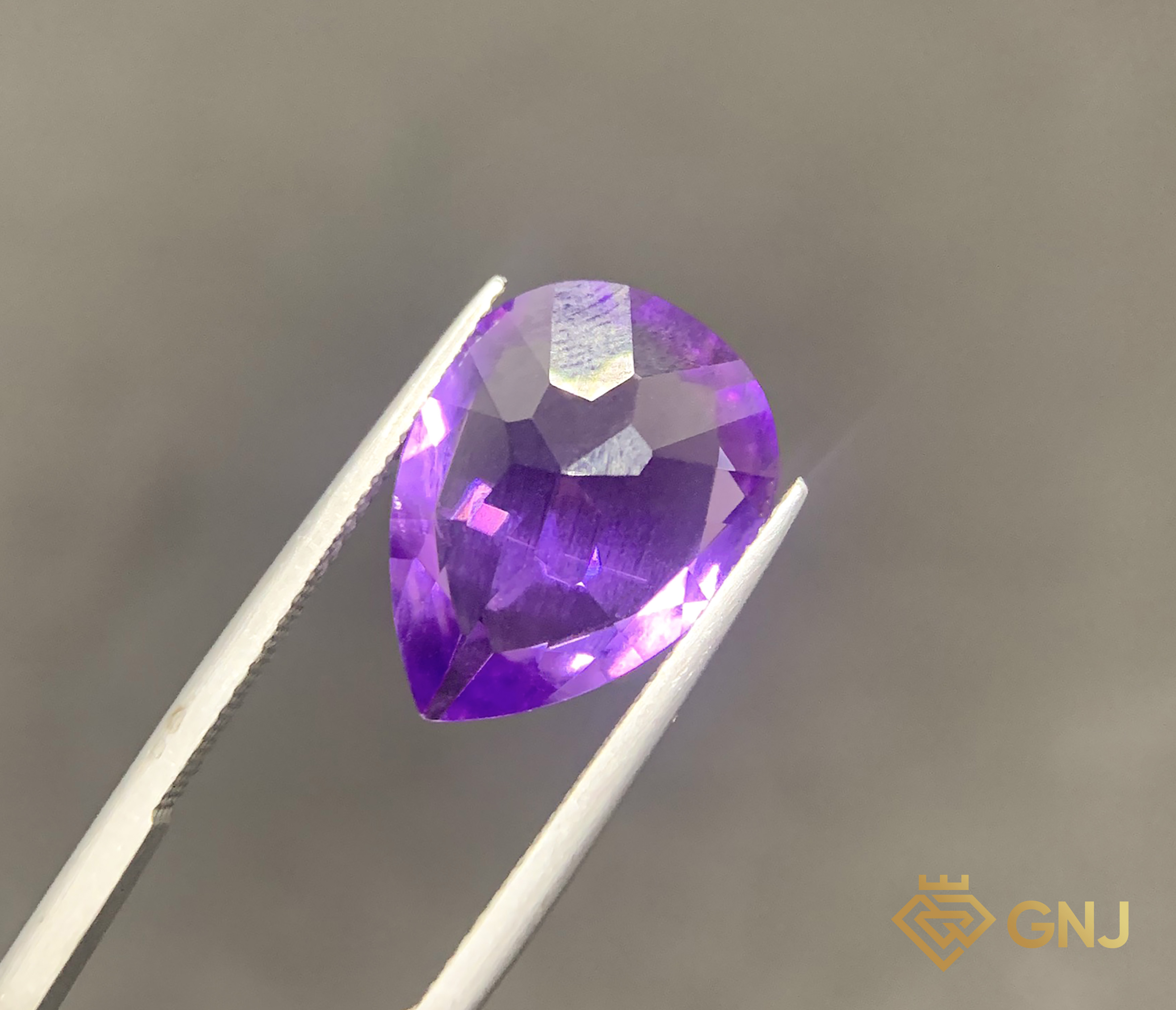Amethyst Tự Nhiên Tím Nhạt 7ct - Facet — chi tiết đá