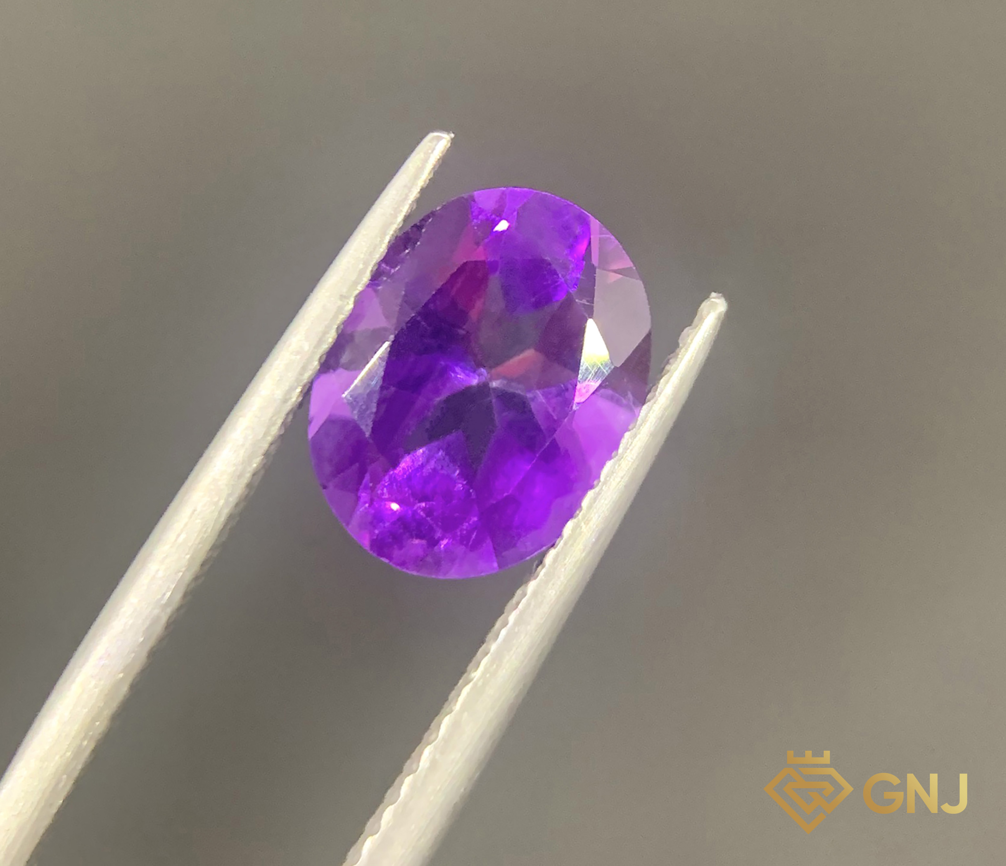 Đá Amethyst Tự Nhiên 9.6ct — Facet — mặt trước, đá quý tự nhiên có kiểm định GNJ