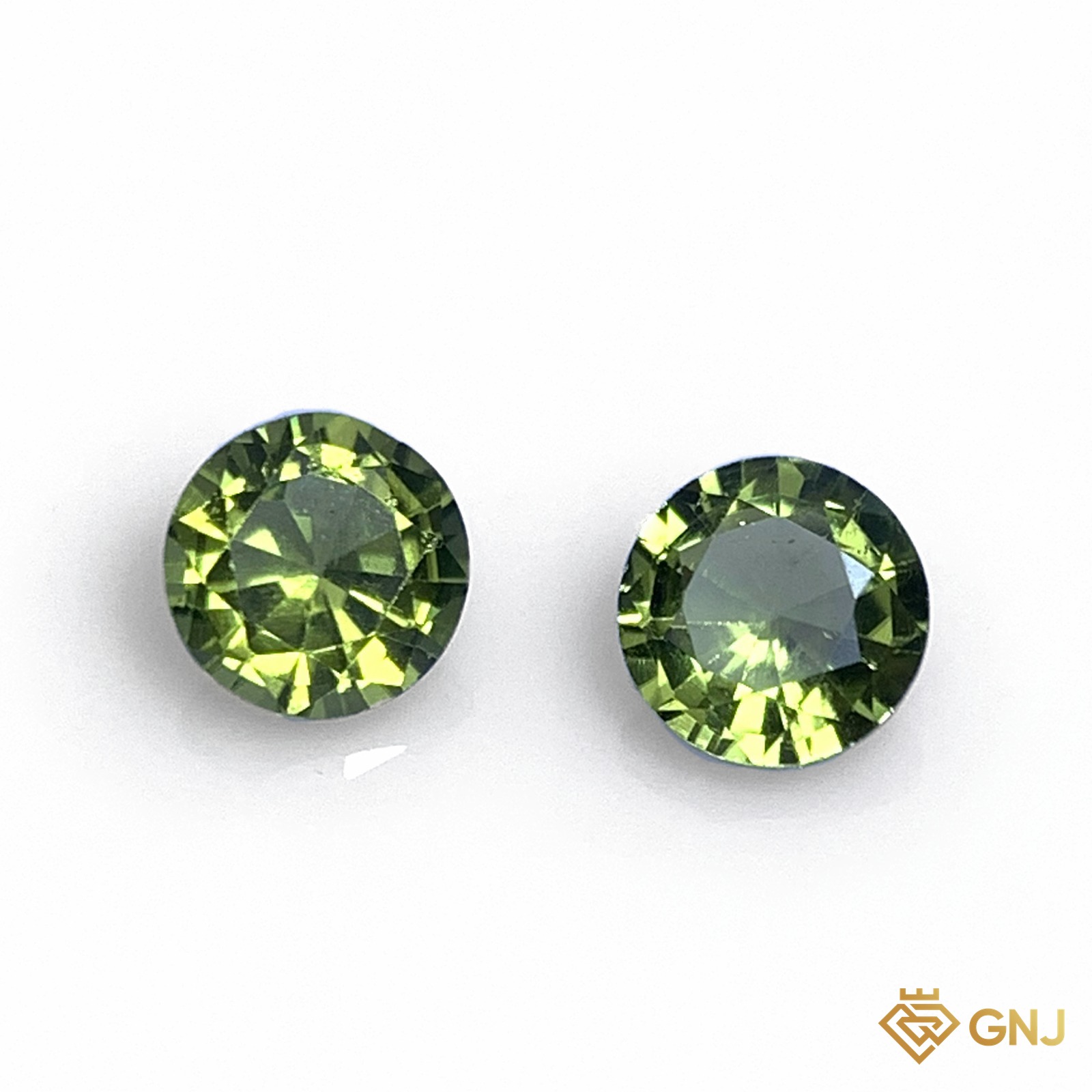 Cặp đá peridot tự nhiên 1,64ct (2 viên) - mặt trước