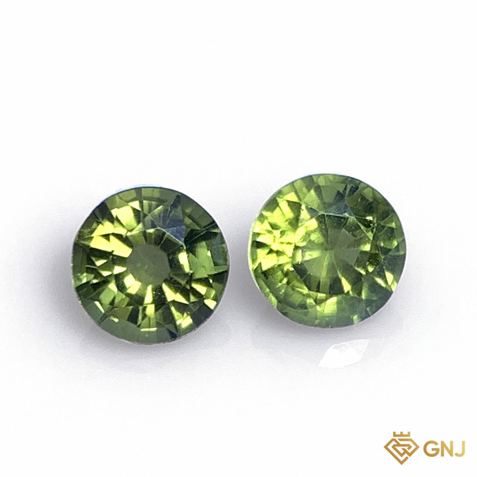 Cặp đá peridot tự nhiên 1,92ct (2 viên) - mặt trước