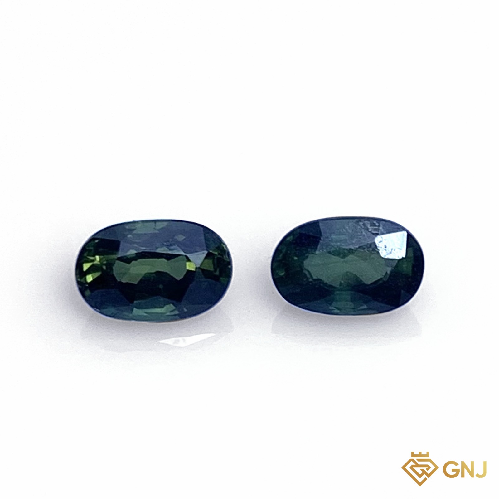Cặp đá sapphire xanh lá tự nhiên 0,50ct (2 viên) - mặt trước