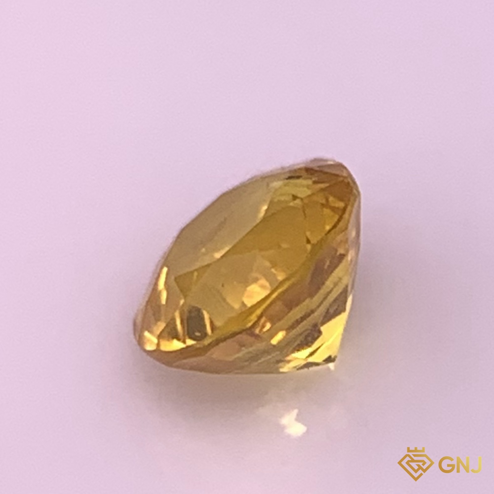 Đá sapphire vàng chanh tự nhiên 0,79ct - góc nghiêng