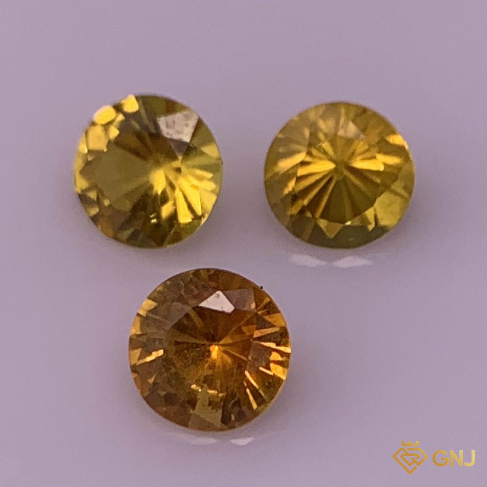 Đá sapphire vàng chanh tự nhiên (viên 0,35-0,55ct) - góc nghiêng