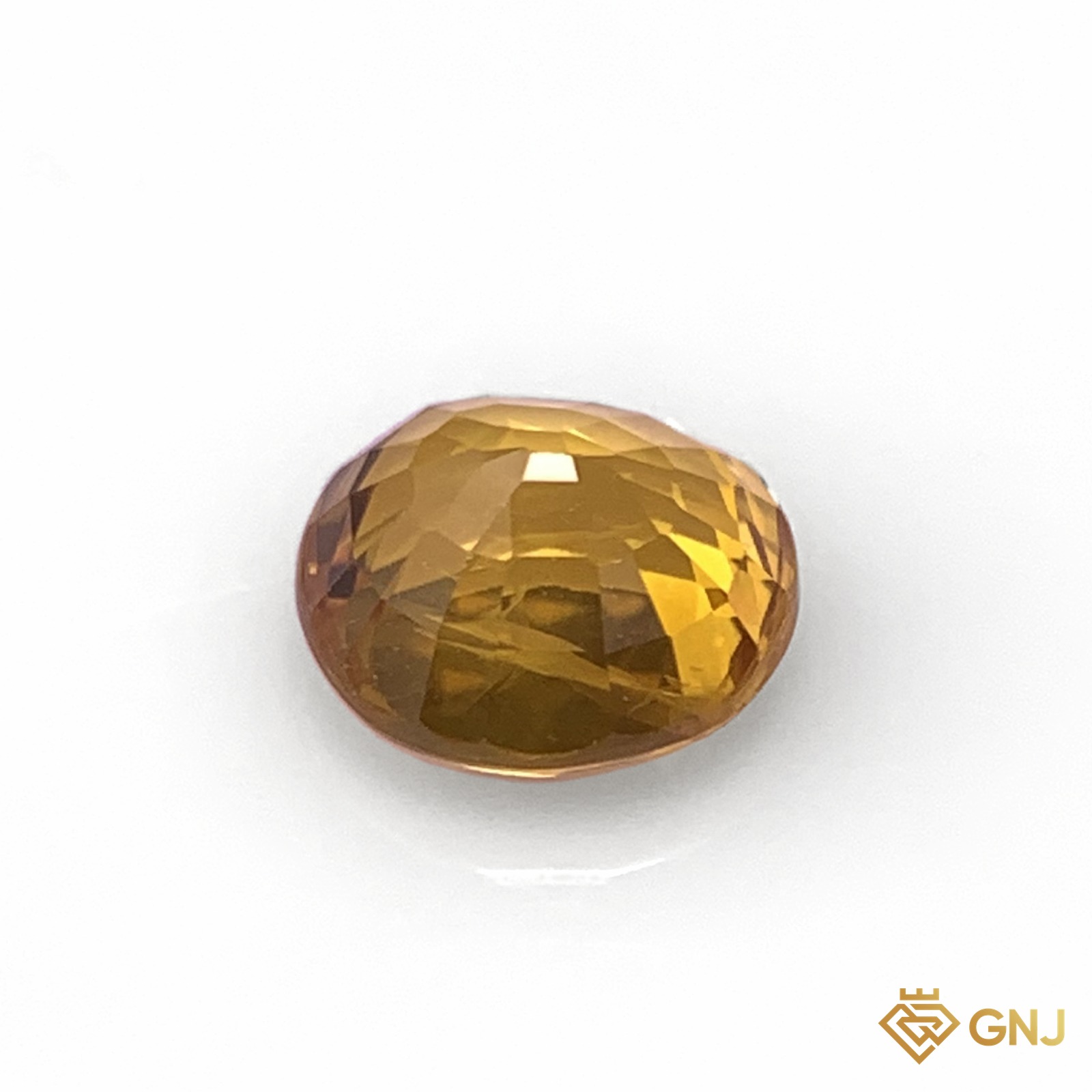 Đá sapphire vàng tự nhiên 0,85ct - mặt sau