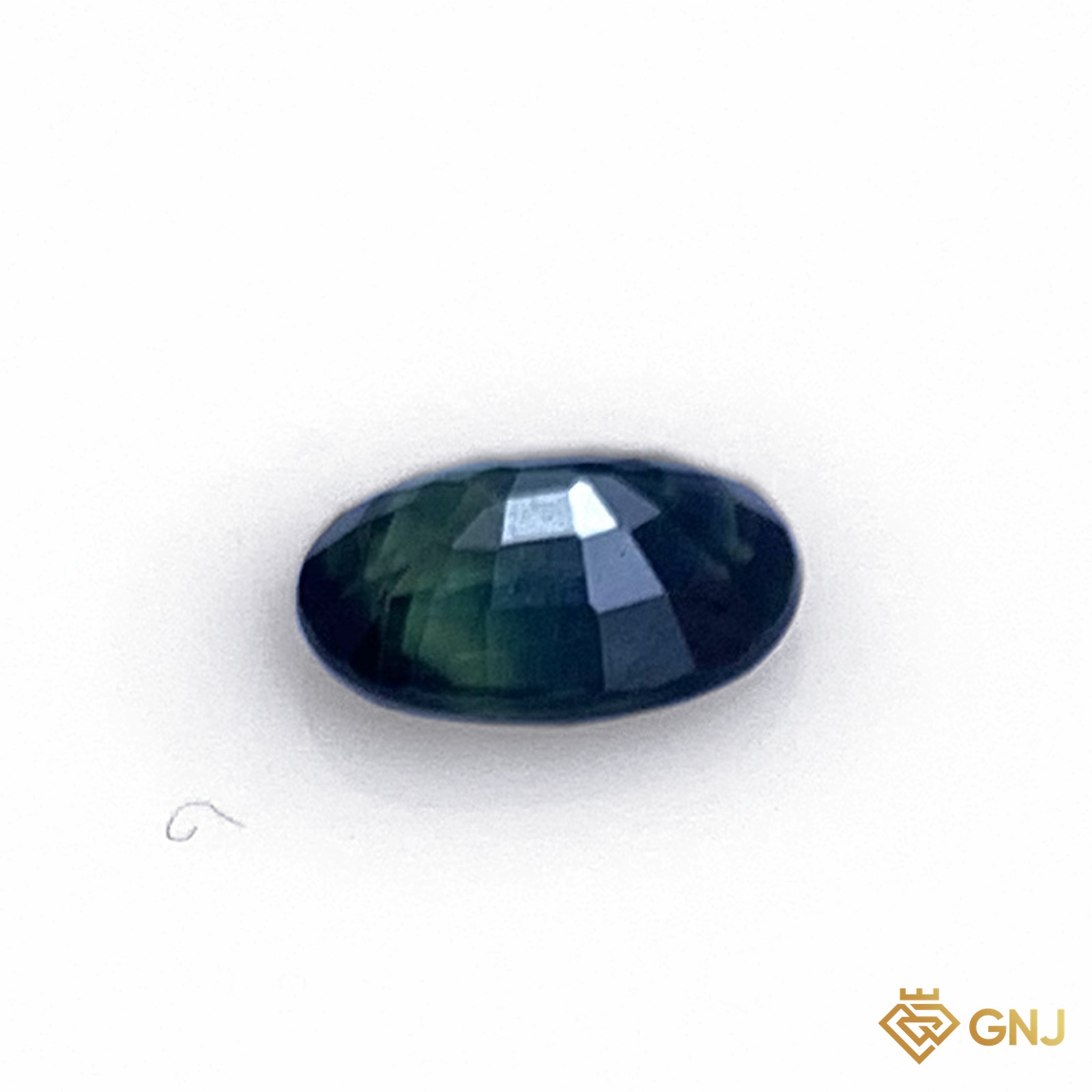 Đá sapphire xanh lá tự nhiên 0,68ct - mặt sau