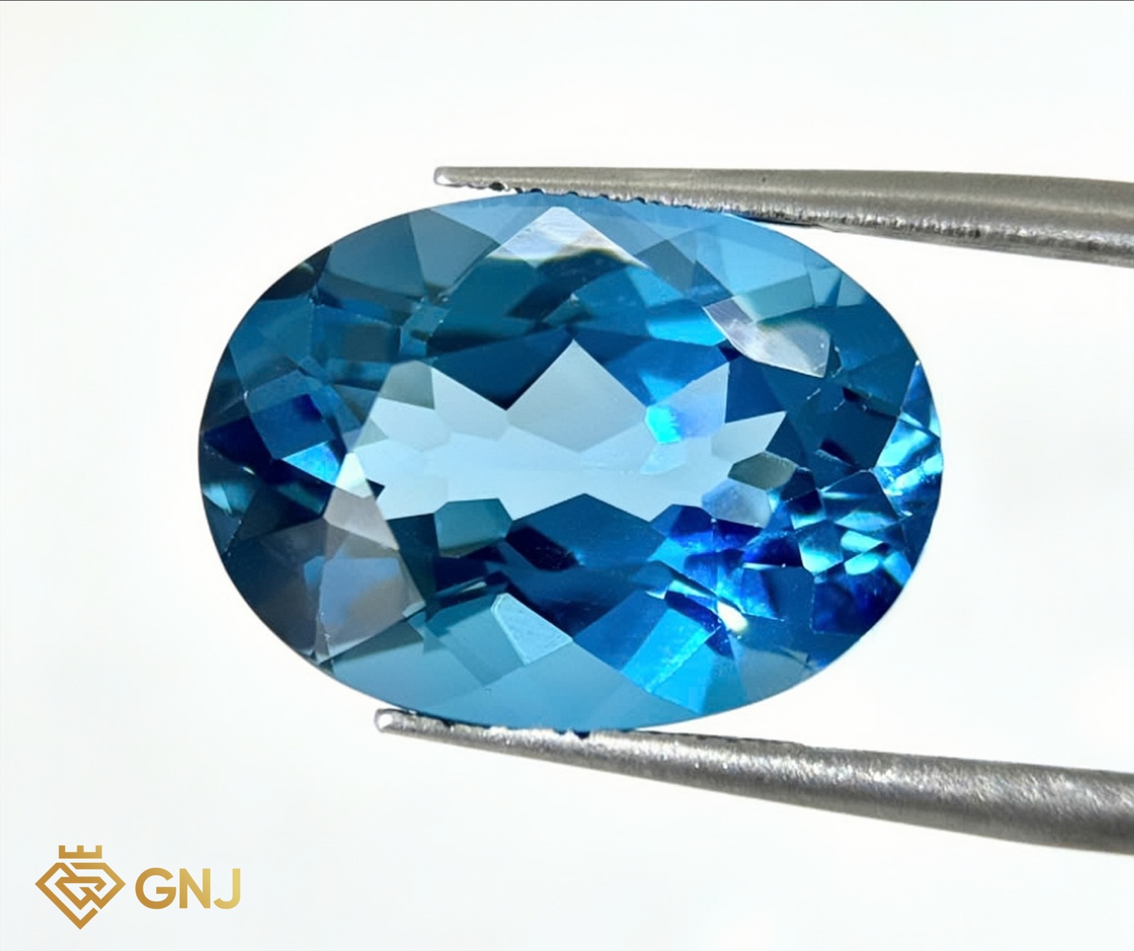 Đá Topaz Xanh Tự Nhiên Xanh Dương 15ct — mặt trước, đá quý tự nhiên có kiểm định GNJ