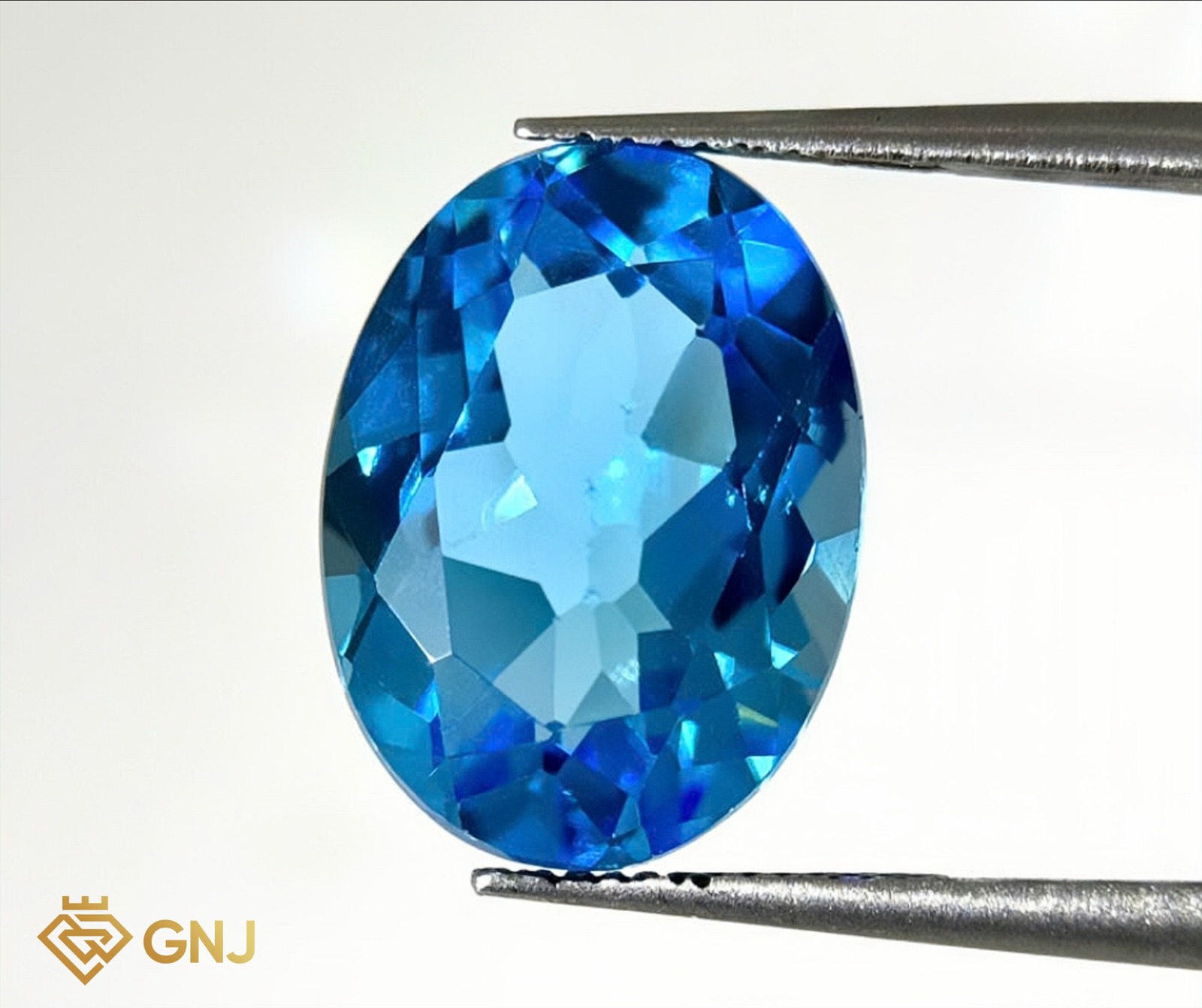 Đá Topaz Xanh Tự Nhiên 16.75ct — mặt trước, đá quý tự nhiên có kiểm định GNJ