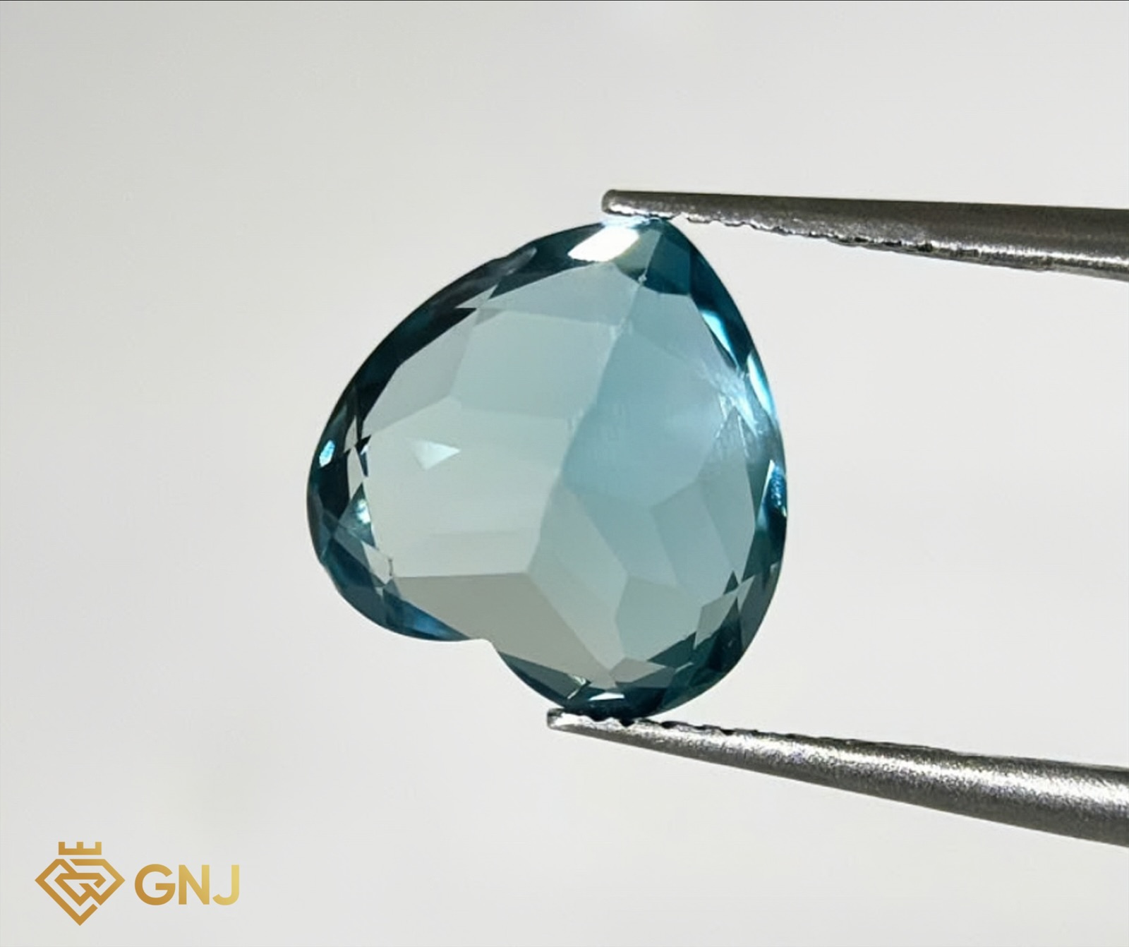 Đá Topaz Xanh Tự Nhiên 6.3ct — mặt bên